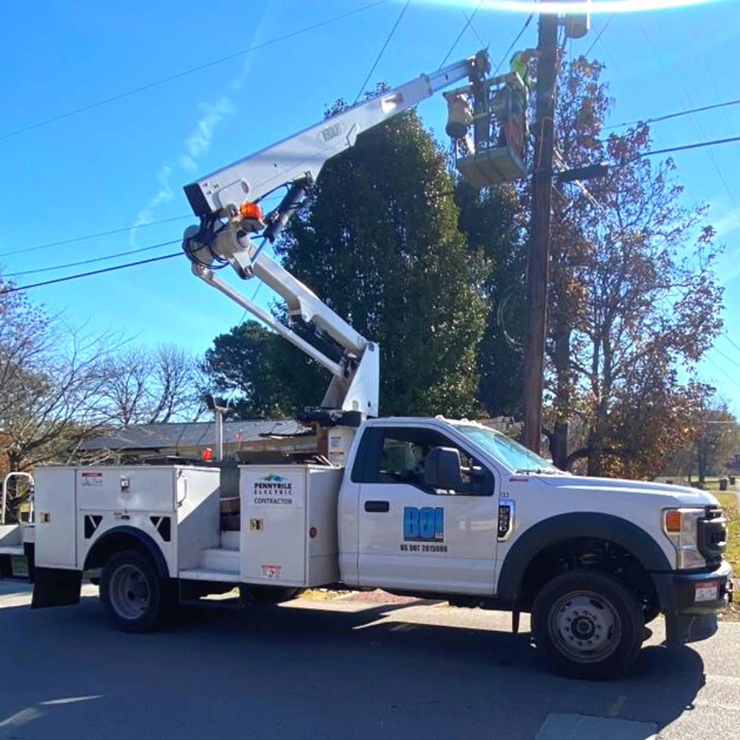 BOI aerial bucket truck crew on a fiber overlash job