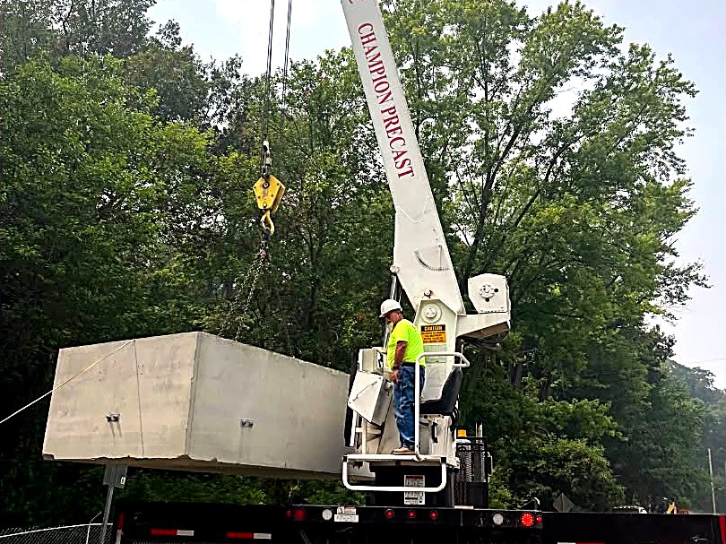 BOI crew placing a fiber vault on a Co-op FTTx build