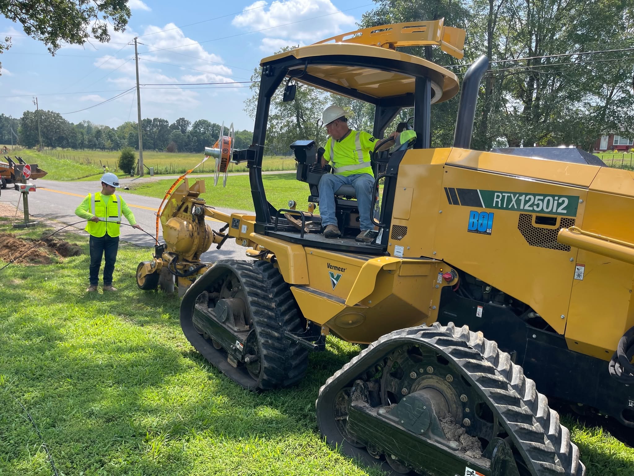 BOI trench crew with a track trencher on the Gulf Shores, Alabama BEAD fiber build