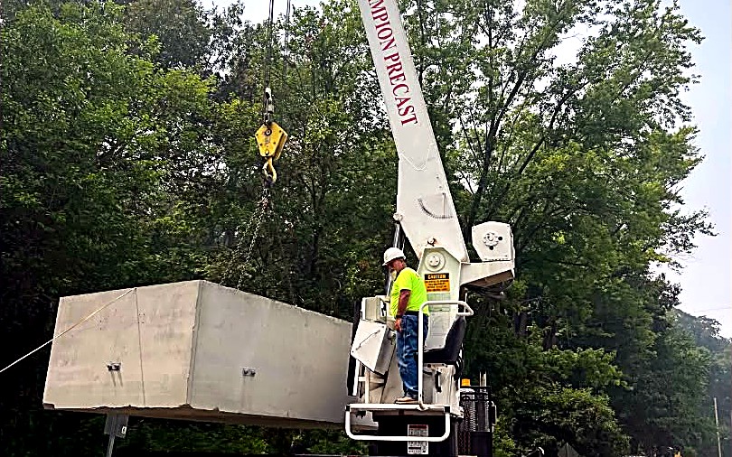 BOI crew placing a fiber vault on a Co-op FTTx build